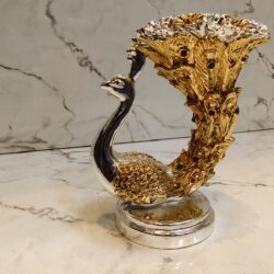 Silver and gold plated peacock